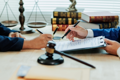 The lawyer explains the contract terms to ensure both parties understand their obligations, noting that any breach may render the agreement void.
